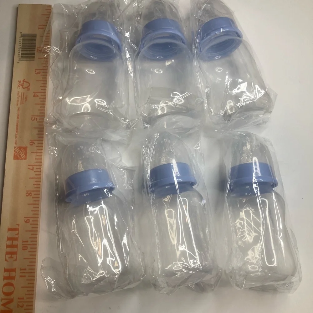 Set of 23 Clear Baby Bottles Blue Caps Baby Shower Party favors. 5 1/2 x2 inches